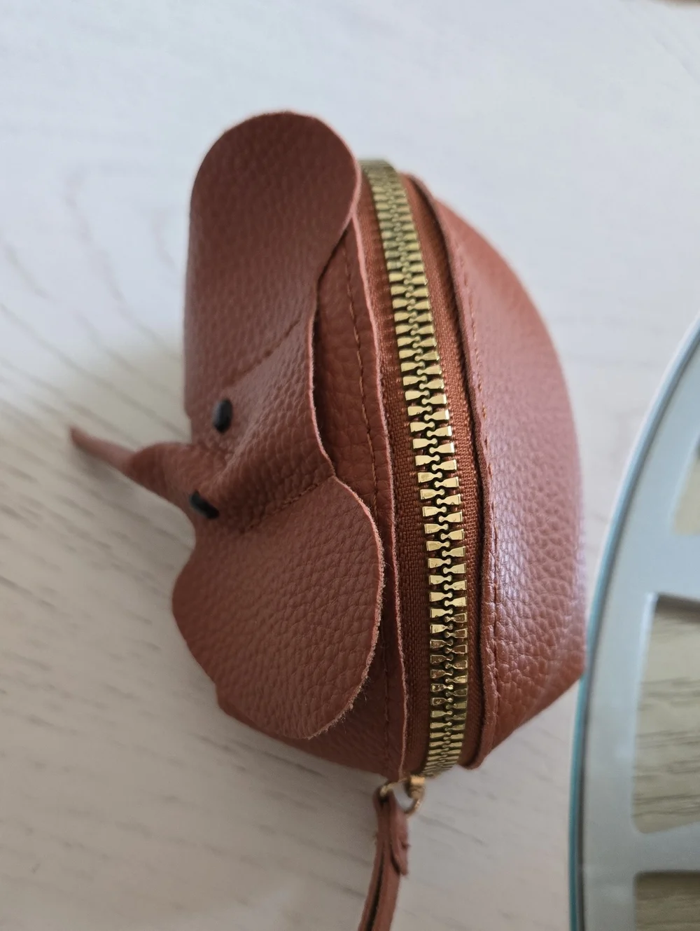 Brown Elephant wristlet/coin.purse is back in stock. Zipper closure -
